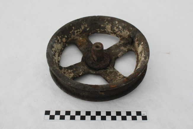 Pulley wheel used as fuel equipment, found near fuel dump at Kenley airfield