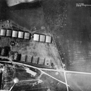 Bessonneau hangars from an earlier time at Kenley. These were sited to the west of the original Hayes Lane (running left to right across the photo) . You can see the permanent Belfast Truss hangars in the bottom left of the photo, which was taken in March 1918.  | IWM Catalogue number Q111444.