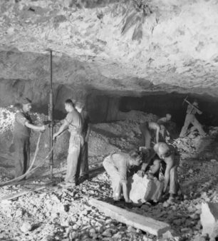 Royal Engineers tunnelling using a water pressure drill to clear solid rock while creating the maze of tunnels running through the Rock of Gibraltar.  | ©️IWM GM63